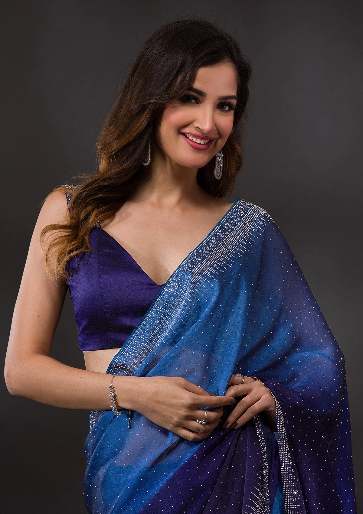 koskii-navy-blue-swarovski-semi-crepe-designer-saree-saus0017312_navy_blue_5_9263ce4e-8503-4580-b4e0-22ca59aaf743.webp Ombre Navy Blue Stonework Satin Designer Saree - Image 1